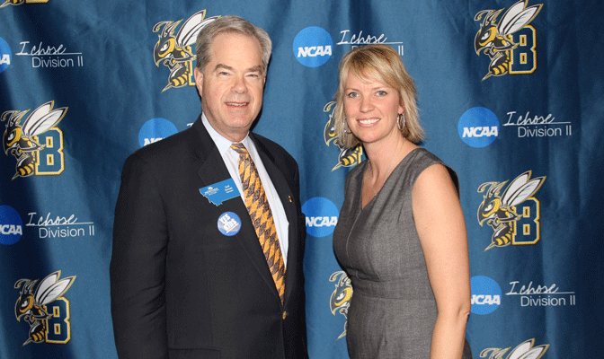 MSUB Chancellor Rolf Groseth and new athletic director Krista Montague pose for a picture.